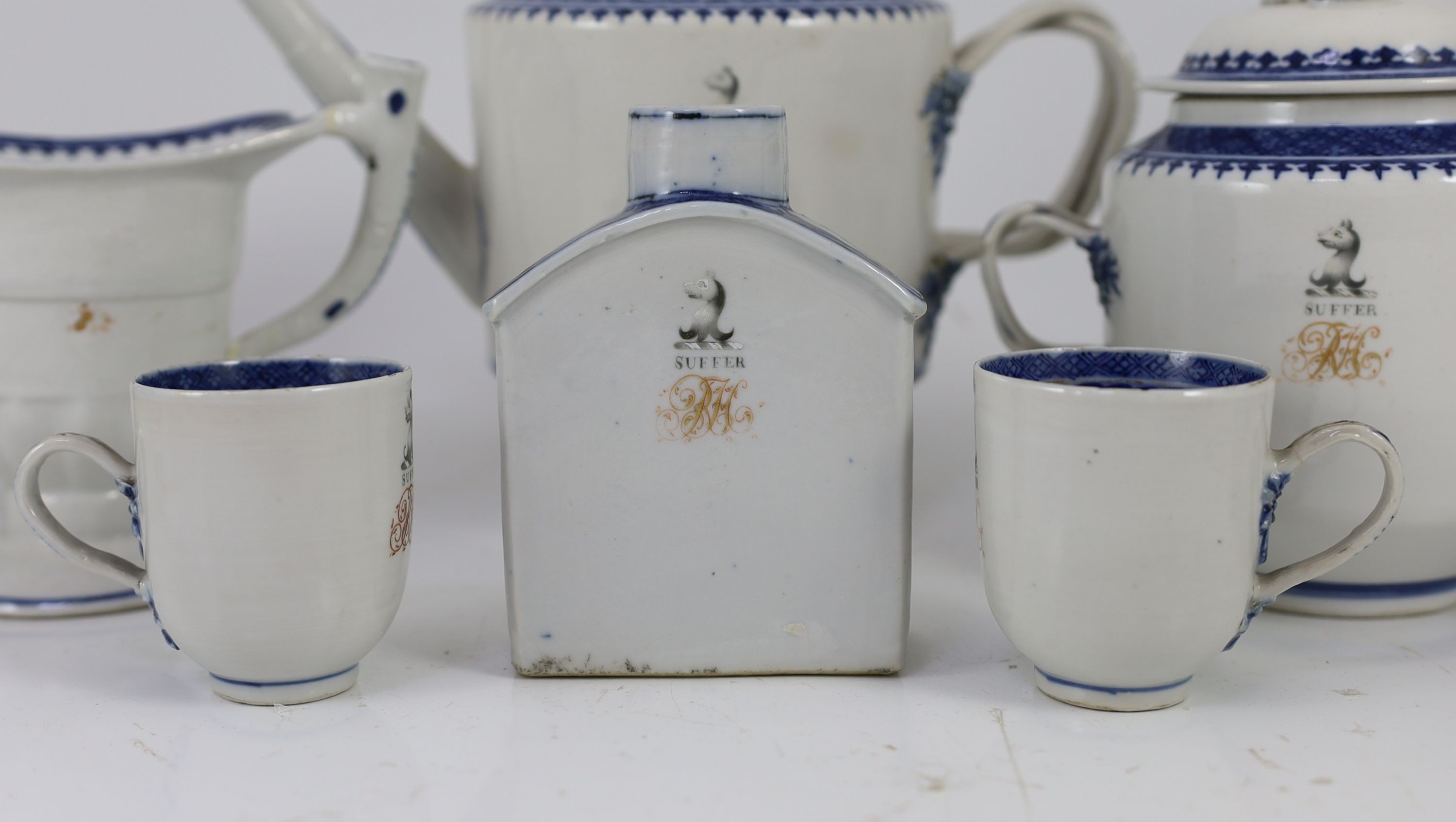 A Chinese export armorial forty two piece part tea service, late 18th century, decorated with the Haldane crest and motto 'Suffer'